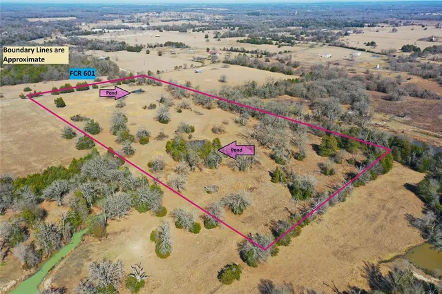 an aerial view of a swimming pool