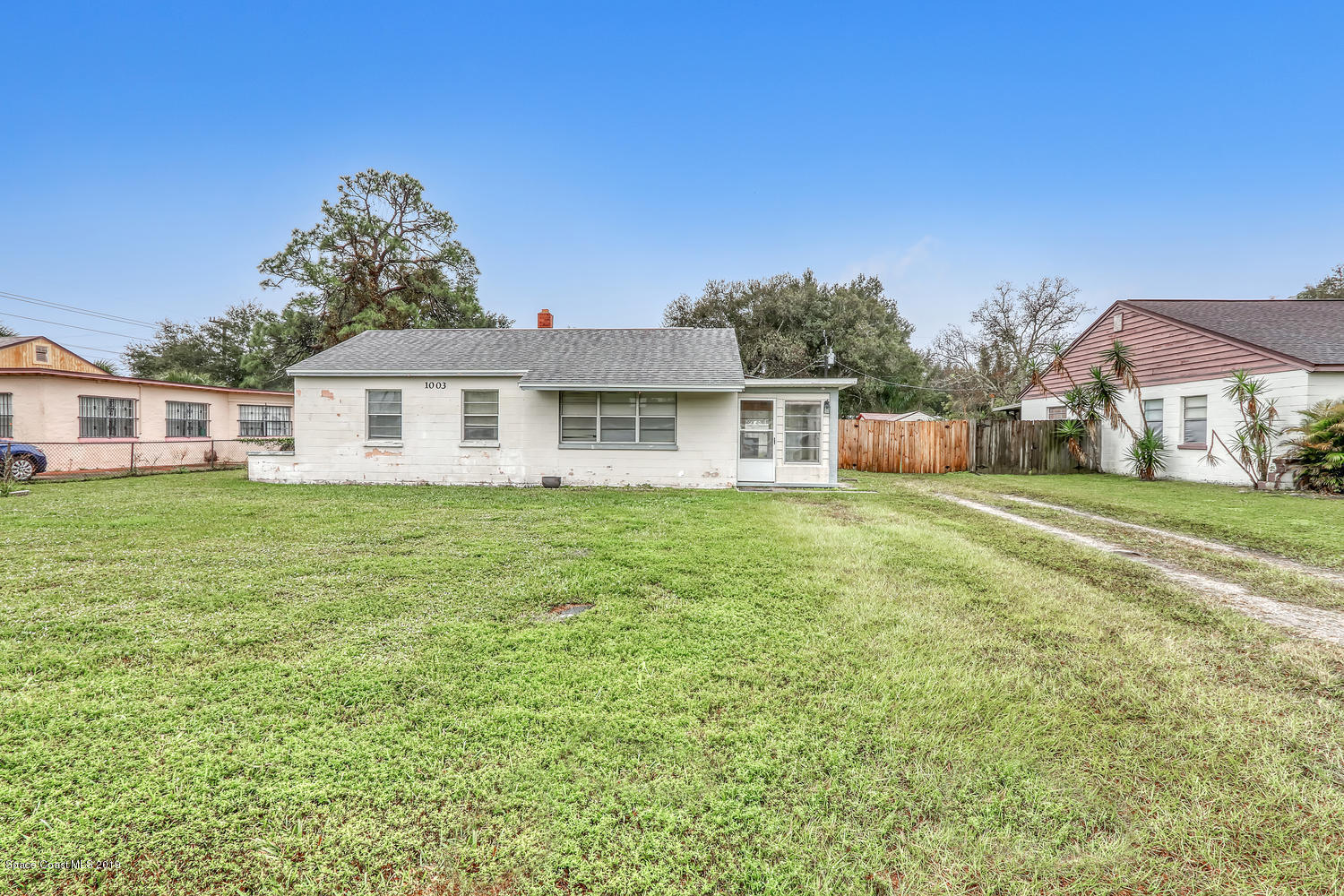 1003 Pinedale Road Rockledge, FL 32955 - Photo 2 of 19 a house view with a garden space