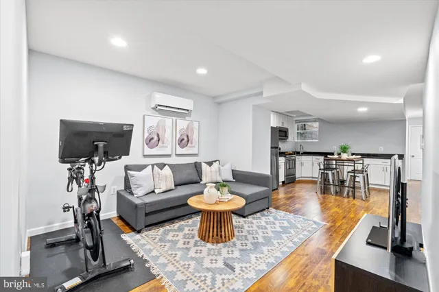 a living room with furniture and a table