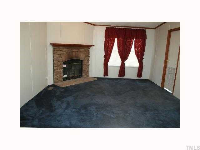 Family room that is open to the kitchen and dining area.