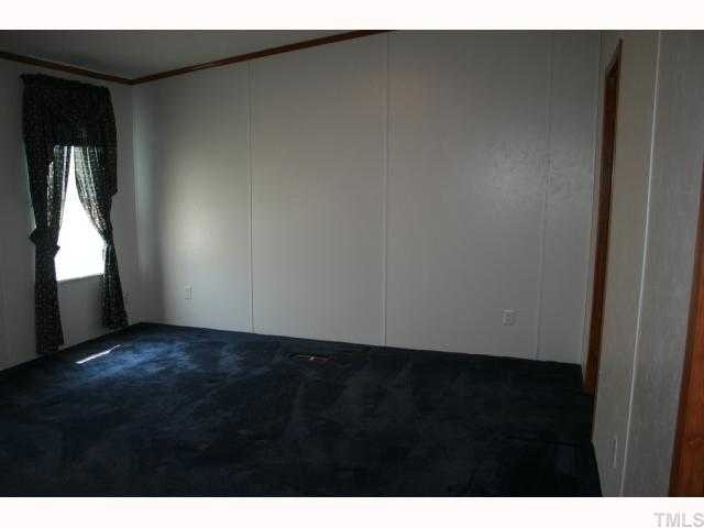 Master Suite is spacious and has its own sitting room with double doors and entrance to master bath.