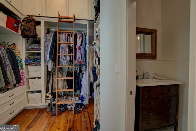 a view of a house with backyard porch and sitting area