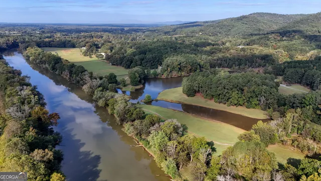 a view of a lake with a mountain in the background