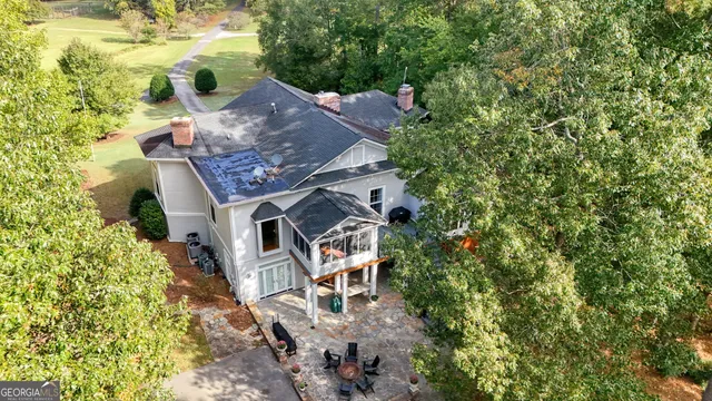 an aerial view of a house with garden space and outdoor space