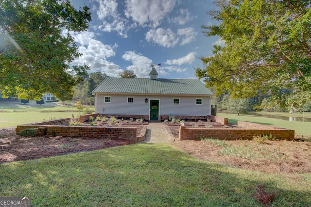 a view of a yard with an outdoor space