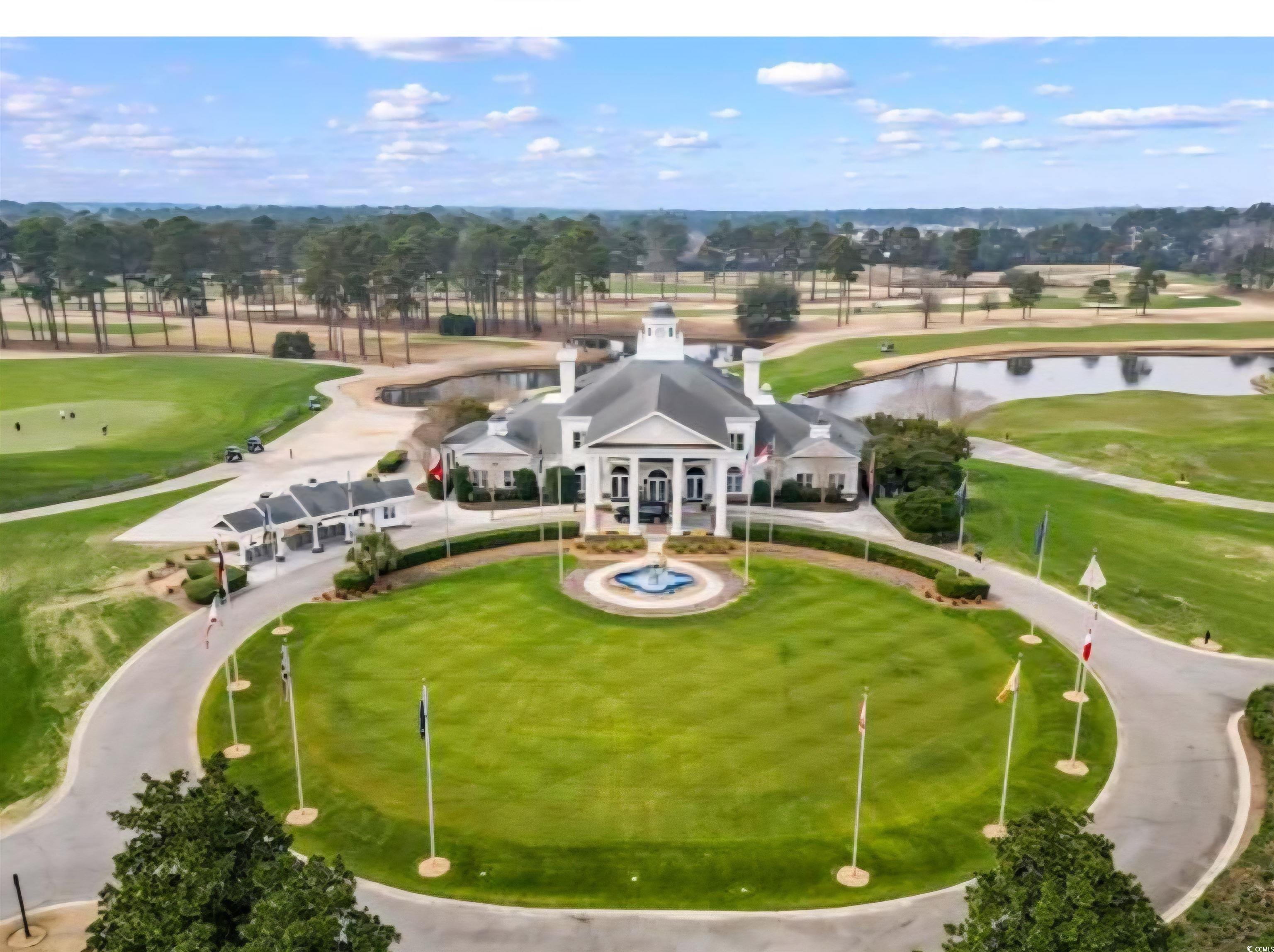 1009 World Tour Boulevard Myrtle Beach, SC 29579 - Photo 18 of 36 Aerial view of a local golf course and a large body of water