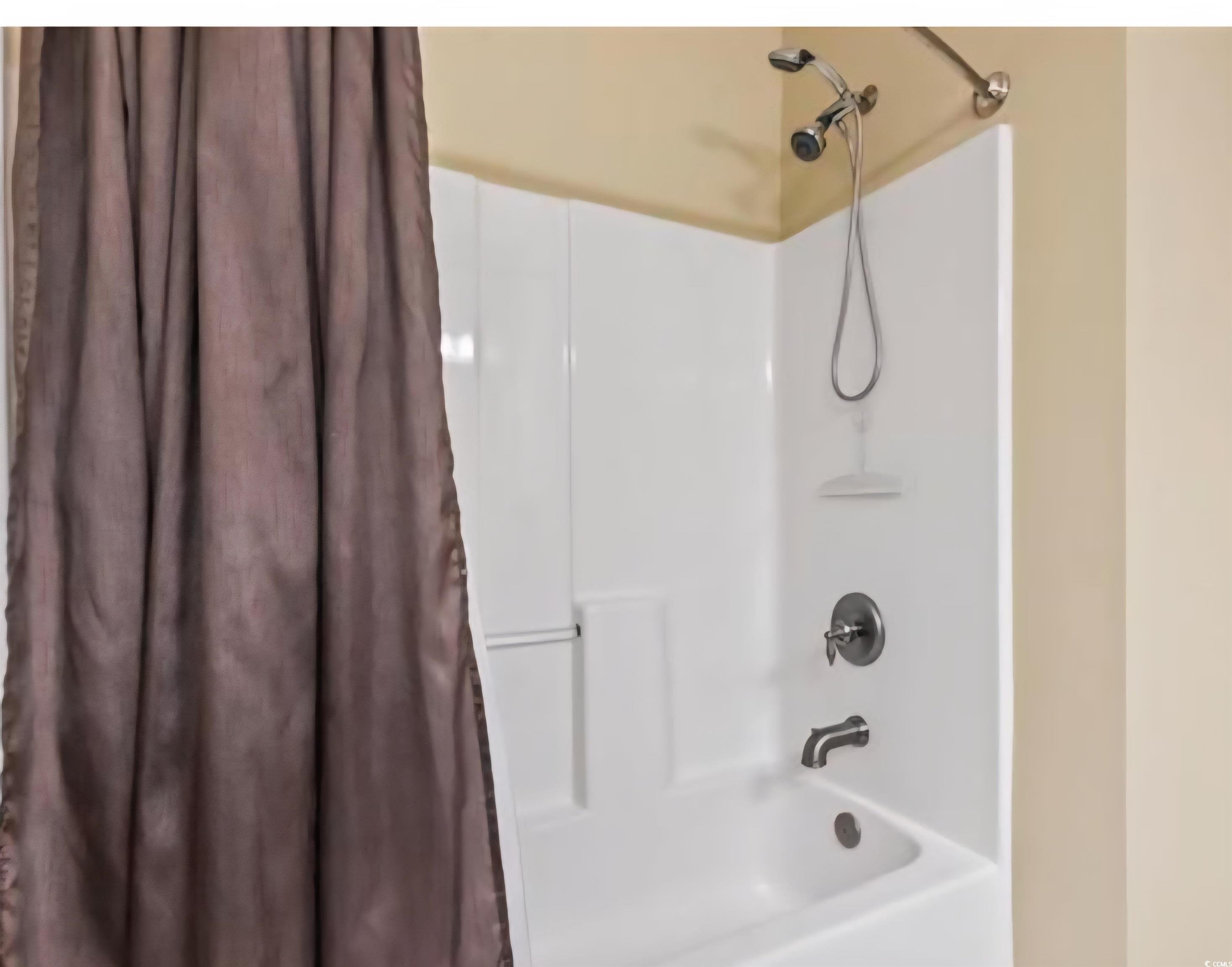 1009 World Tour Boulevard Myrtle Beach, SC 29579 - Photo 23 of 36 Full bath with shower / bath combo with shower curtain