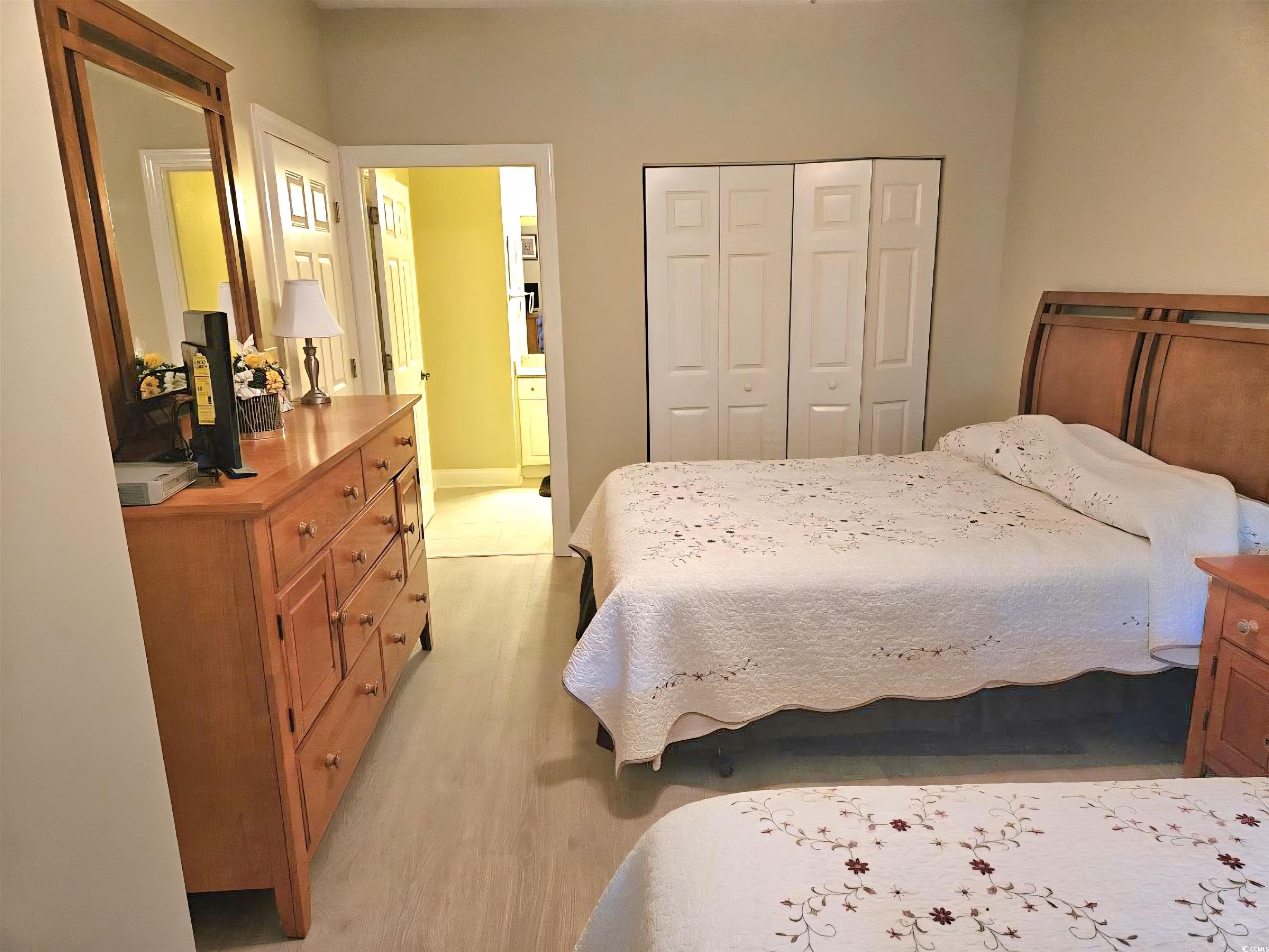 1009 World Tour Boulevard Myrtle Beach, SC 29579 - Photo 6 of 36 new floors , Bedroom featuring a closet and light wood-style flooring