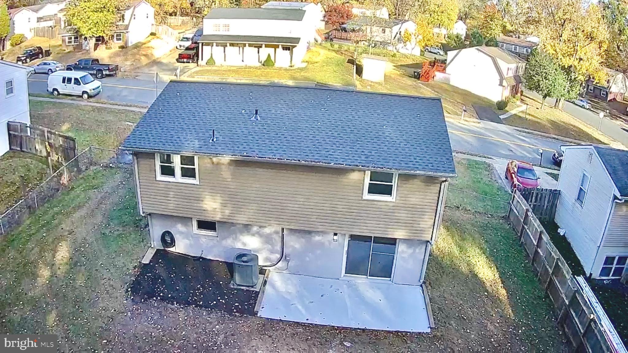 13014 Kerrydale Road Woodbridge, VA 22193 - Photo 11 of 53 a front view of a house with a yard
