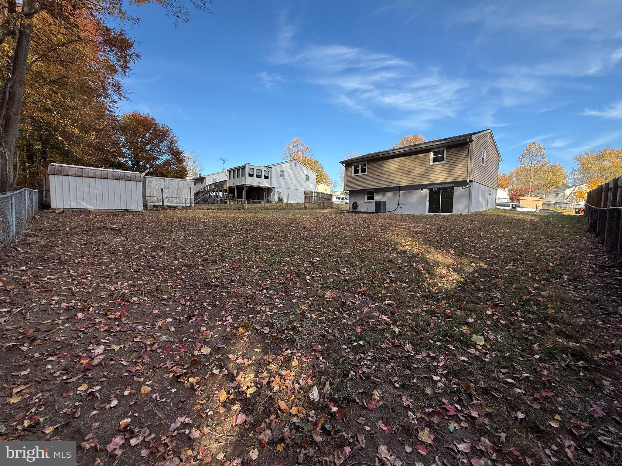 13014 Kerrydale Road Woodbridge, VA 22193 - Photo 15 of 52 a front view of a house with a yard