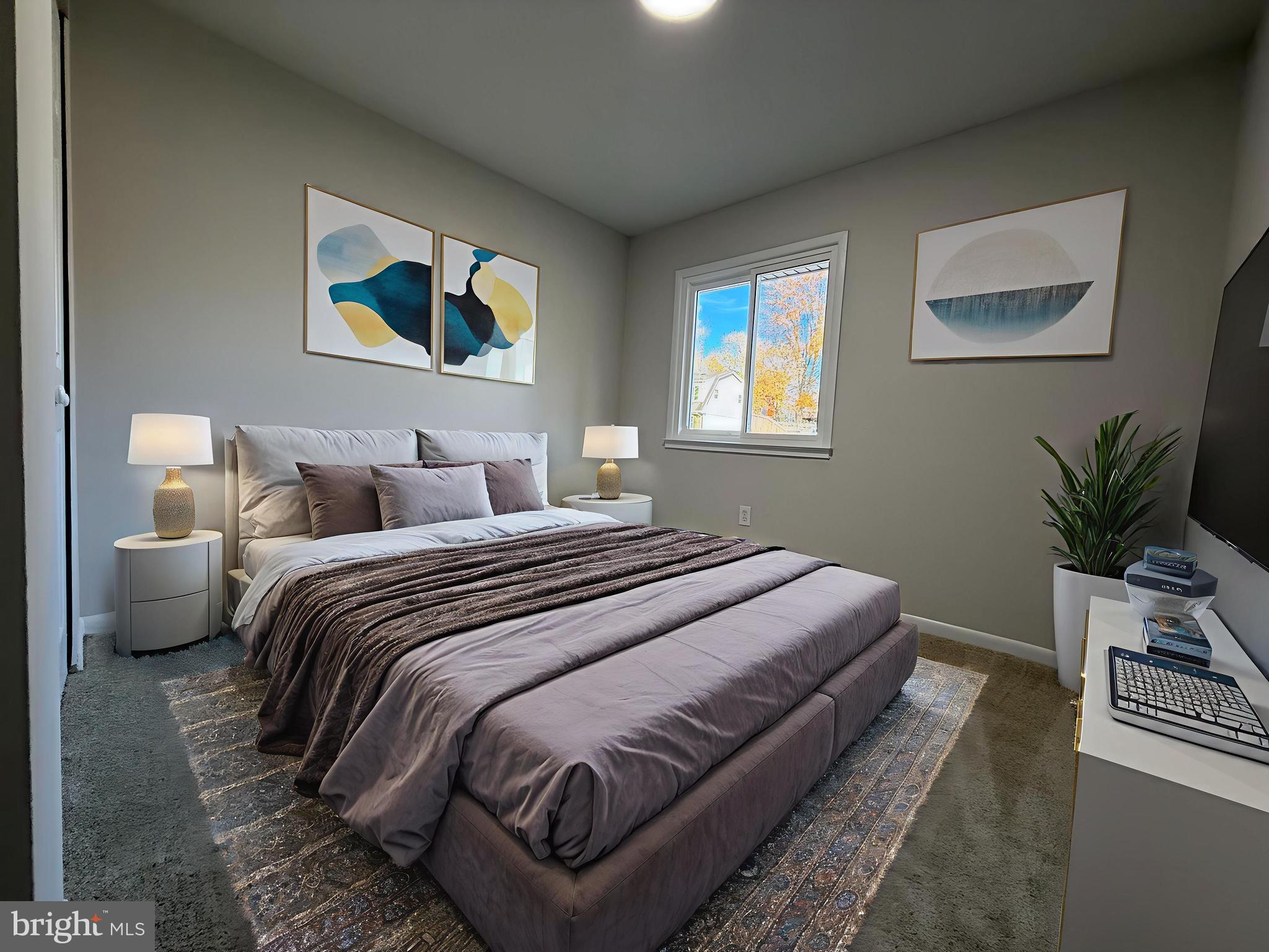 13014 Kerrydale Road Woodbridge, VA 22193 - Photo 39 of 52 a bedroom with bed and a potted plant