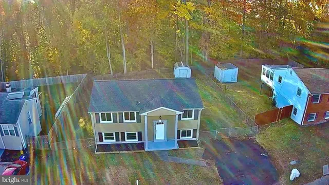 swimming pool view with a seating space