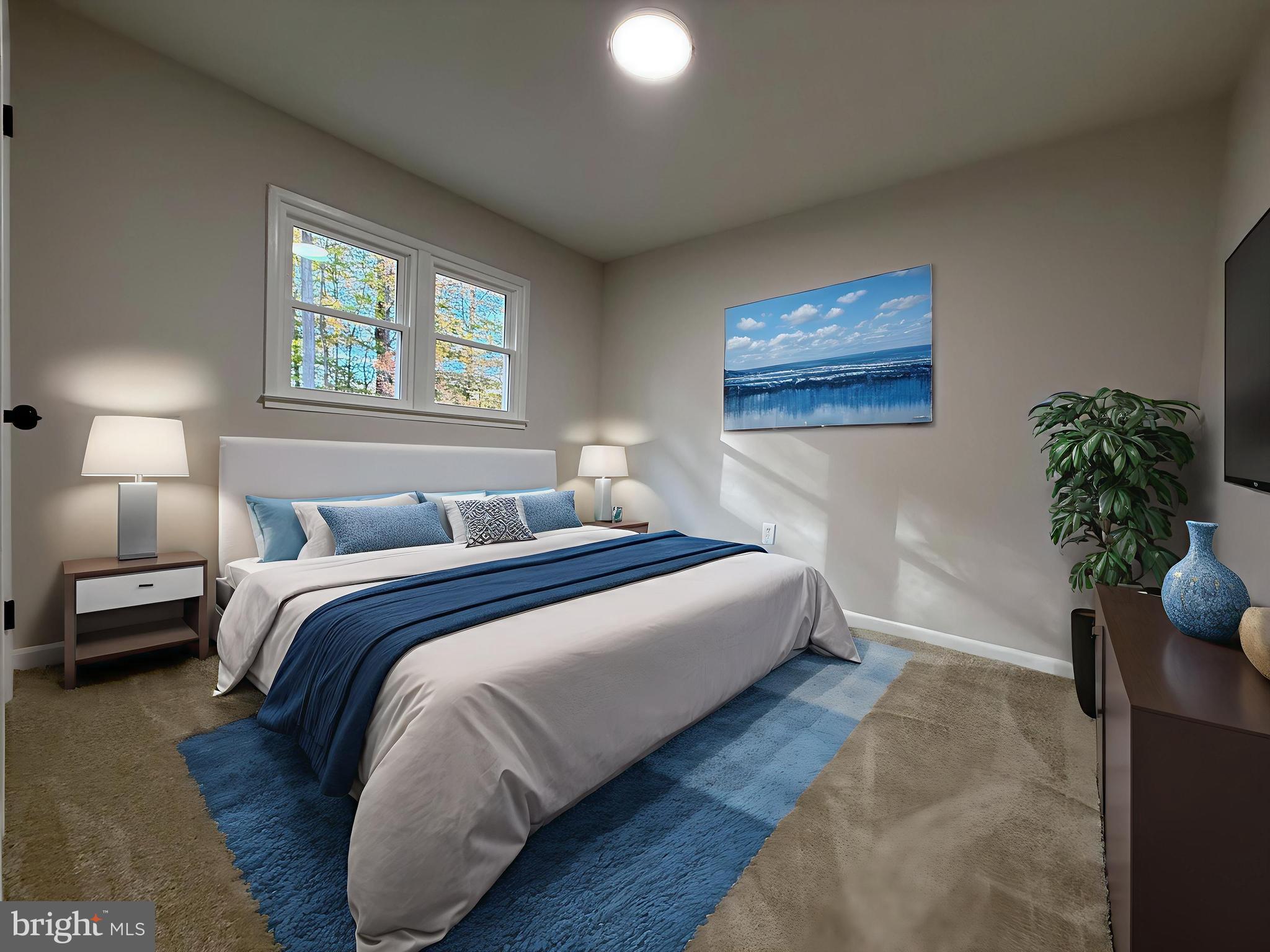 13014 Kerrydale Road Woodbridge, VA 22193 - Photo 41 of 52 a bedroom with bed and a potted plant