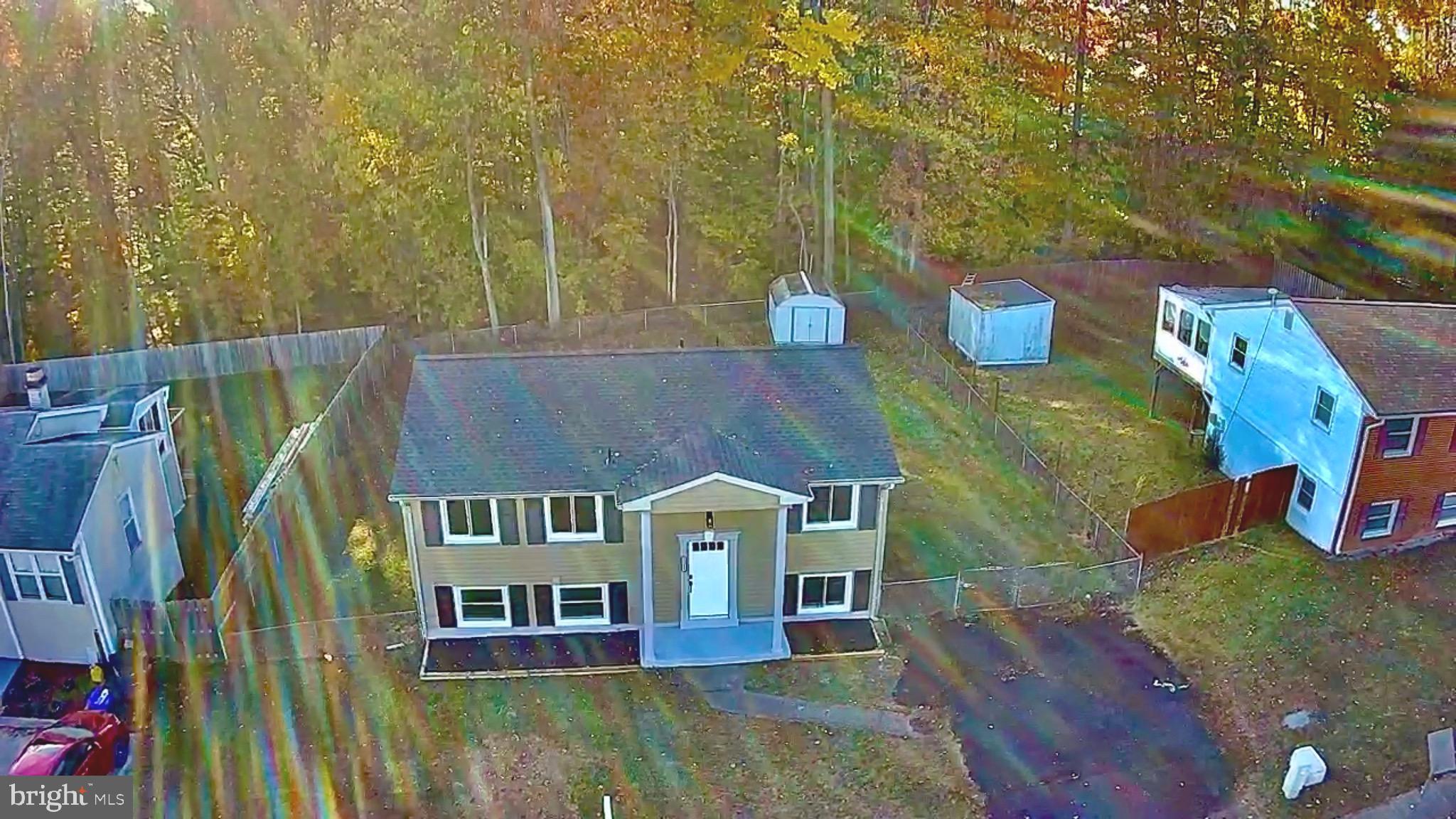 13014 Kerrydale Road Woodbridge, VA 22193 - Photo 6 of 53 swimming pool view with a seating space