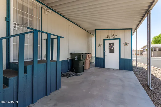 a view of a porch with furniture