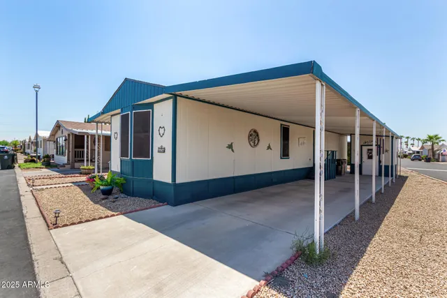 a view of a house with a street