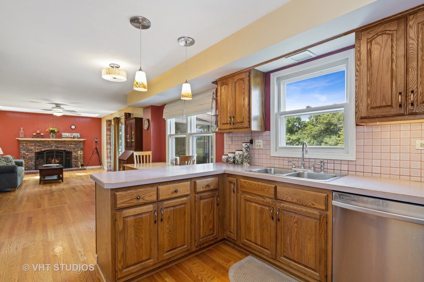 886 Fair Way Libertyville, IL 60048 - Photo 4 of 17 a kitchen with a sink window and cabinets