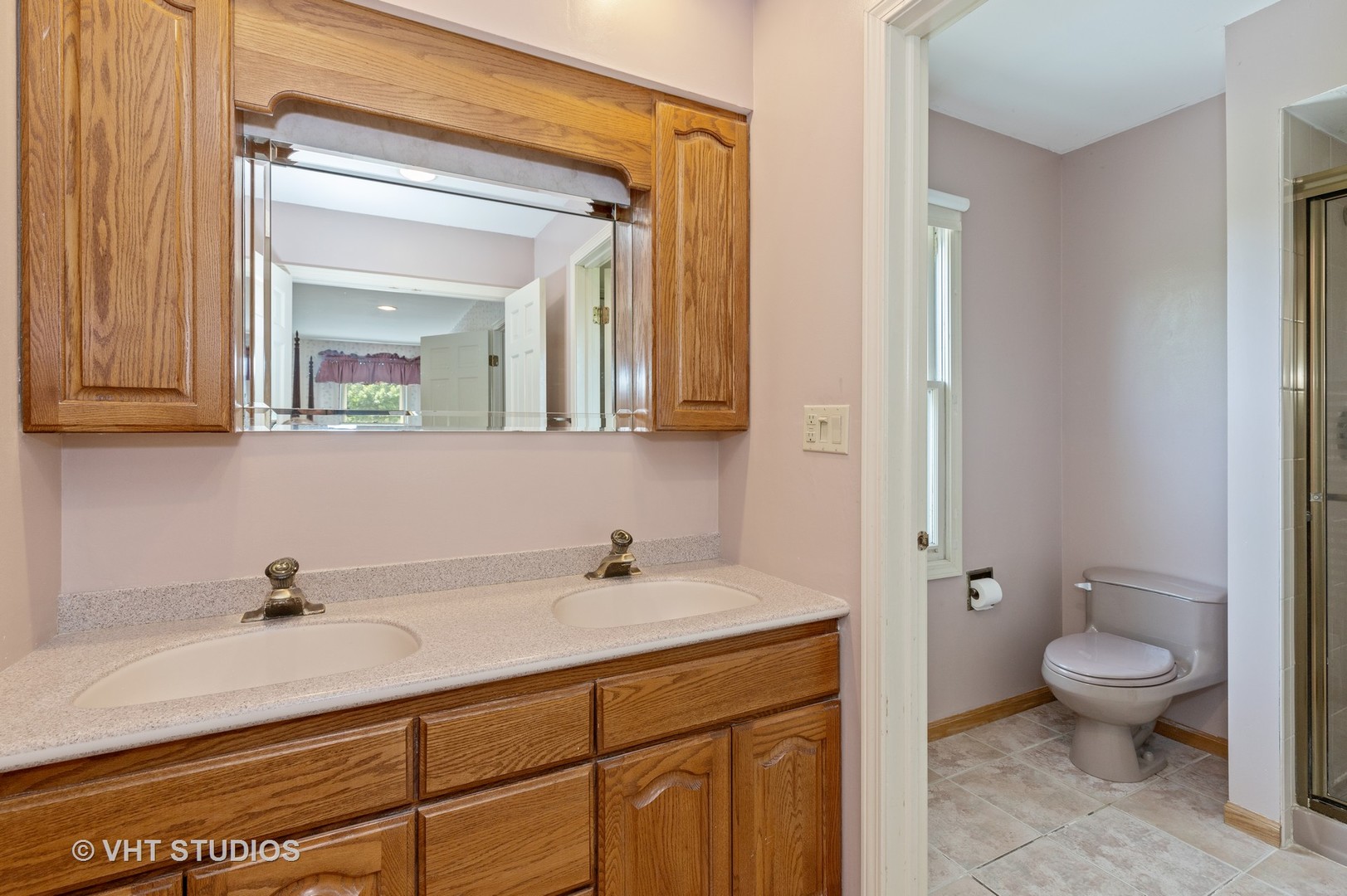 886 Fair Way Libertyville, IL 60048 - Photo 10 of 17 a bathroom with a sink and a mirror