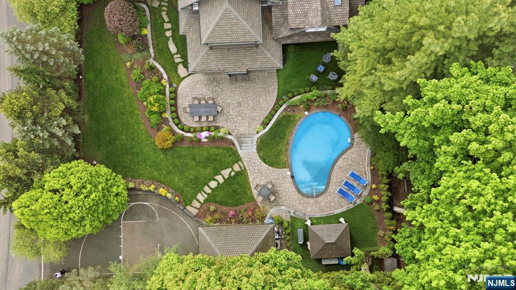 203 Heights Road Ridgewood, NJ 07450 - Photo 34 of 41 an aerial view of a house with a garden and a fountain