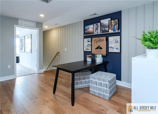 a view of hallway with washer and dryer