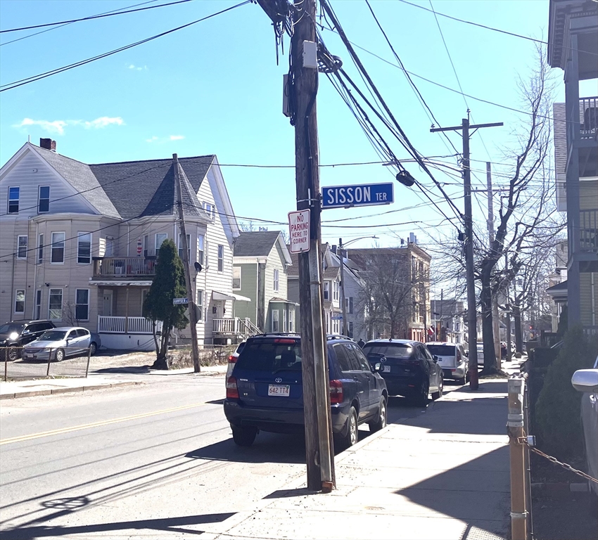 4 Sisson Terrace, Unit 1 Lynn, MA 01902 - Photo 2 of 16 a view of a building with cars