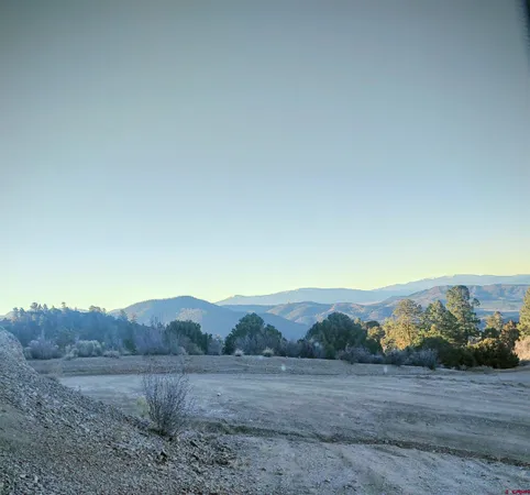 a view of mountain with sunset view