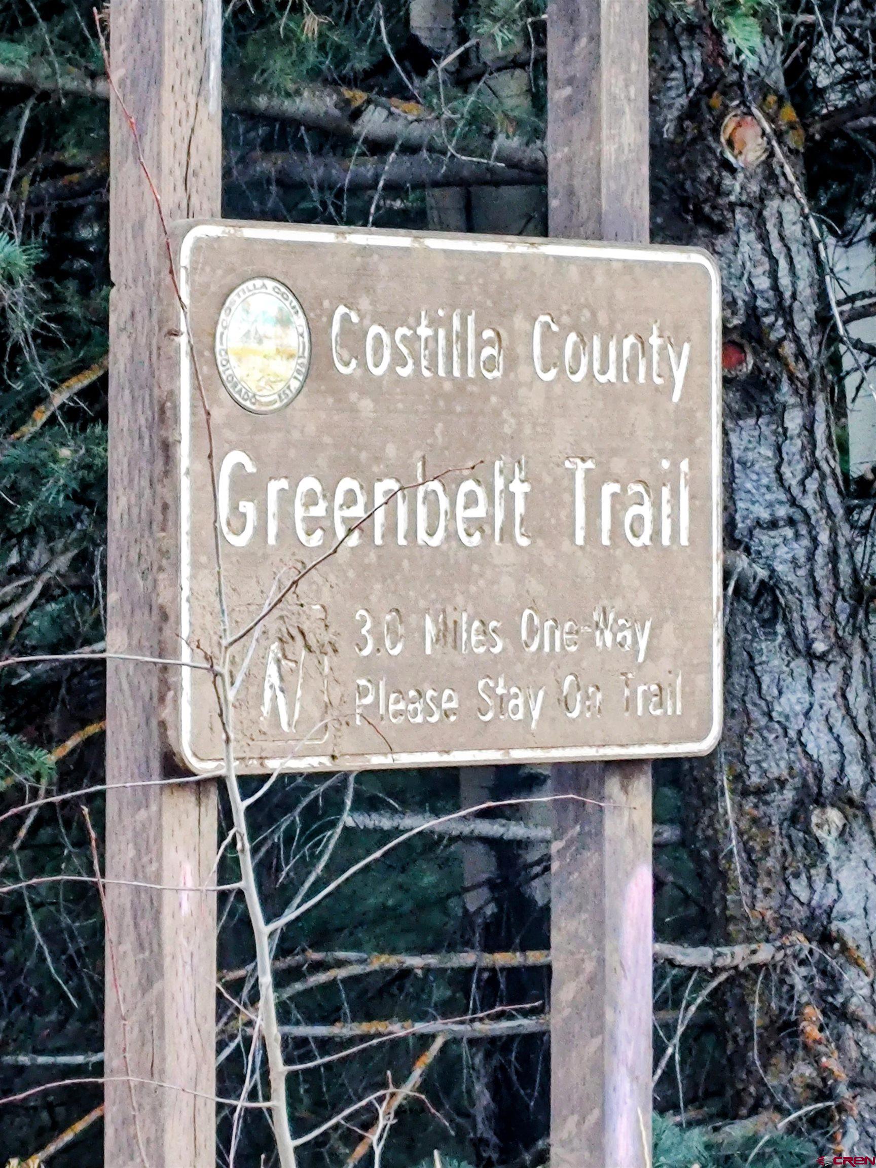 Lot 5701 Dettman Road Fort Garland, CO 81133 - Photo 6 of 7 a sign on the side of a building