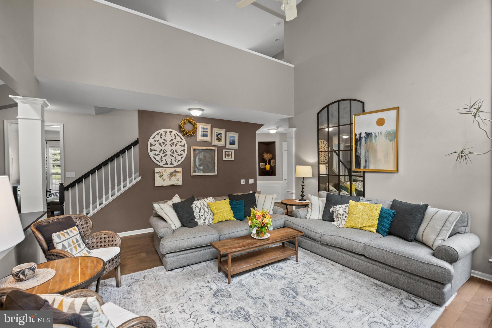 206 Sullivan Drive Mickleton, NJ 08056 - Photo 11 of 59 a living room with furniture and a lamp