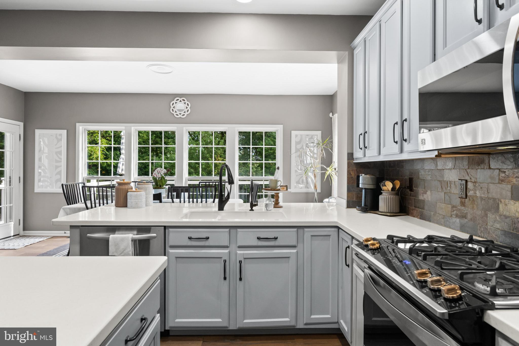 206 Sullivan Drive Mickleton, NJ 08056 - Photo 17 of 59 a kitchen with a stove and a white floor