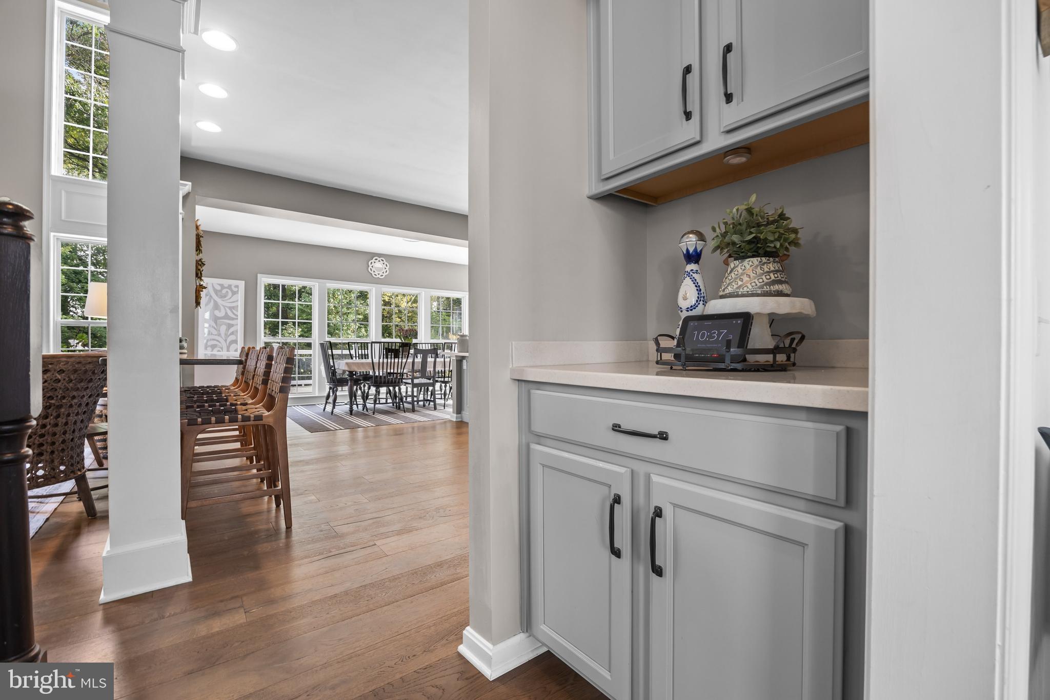 206 Sullivan Drive Mickleton, NJ 08056 - Photo 20 of 59 a kitchen with white cabinets and wooden floor