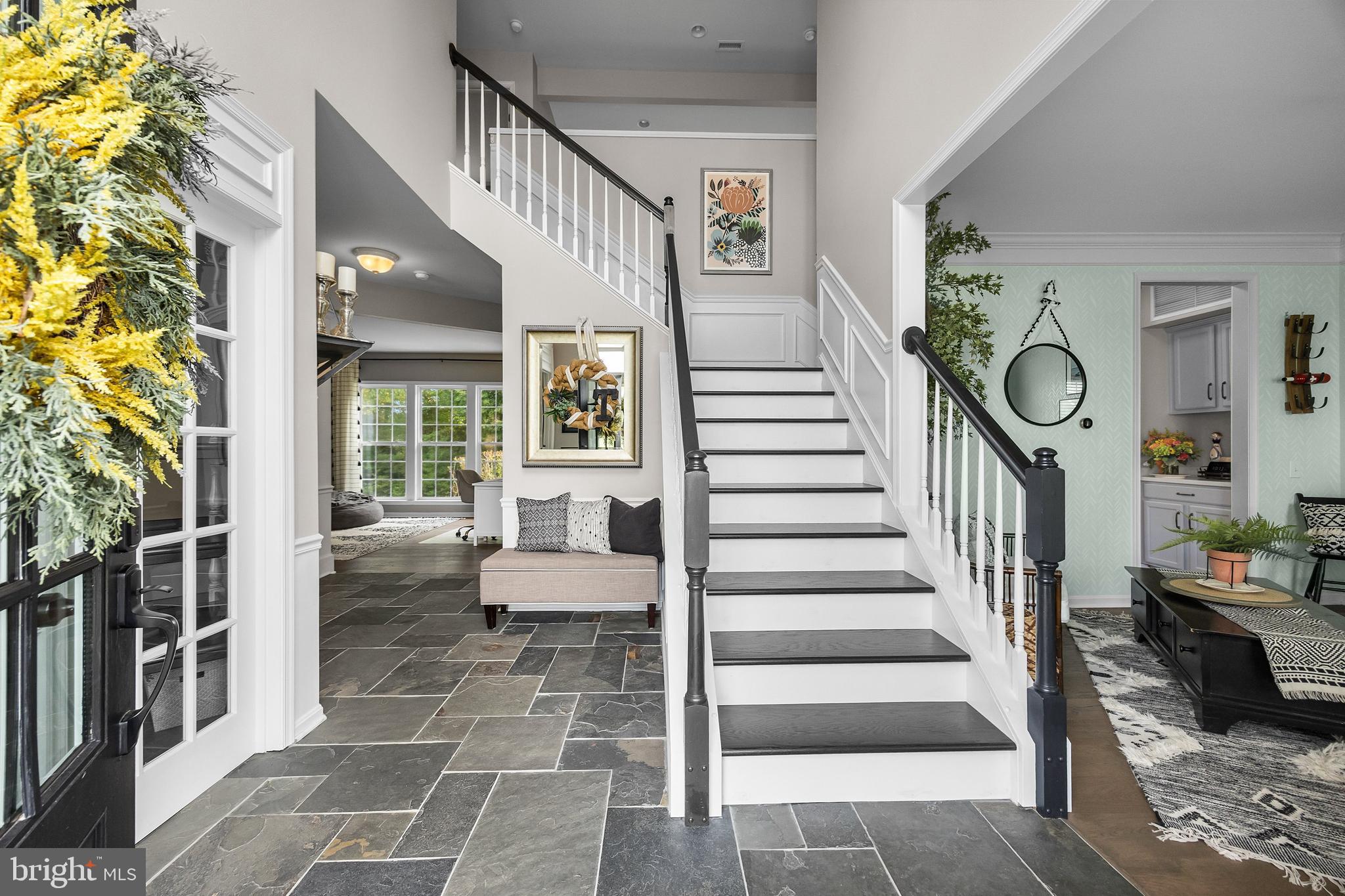 206 Sullivan Drive Mickleton, NJ 08056 - Photo 2 of 59 a view of staircase with lots of windows and a rug