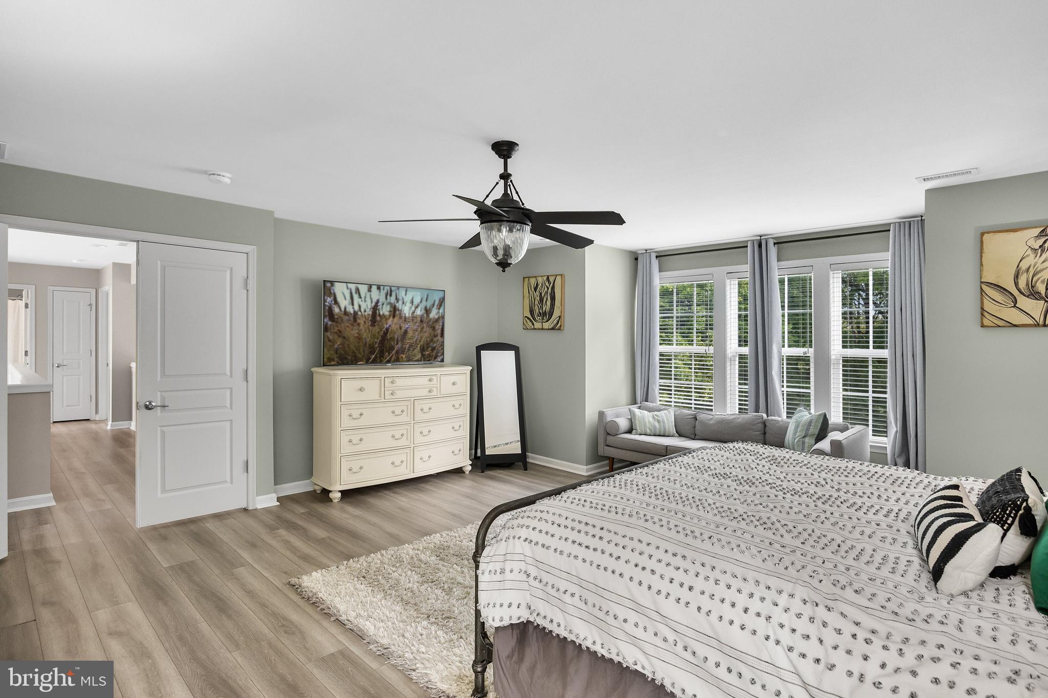 206 Sullivan Drive Mickleton, NJ 08056 - Photo 26 of 59 a bedroom with a bed mirror and window