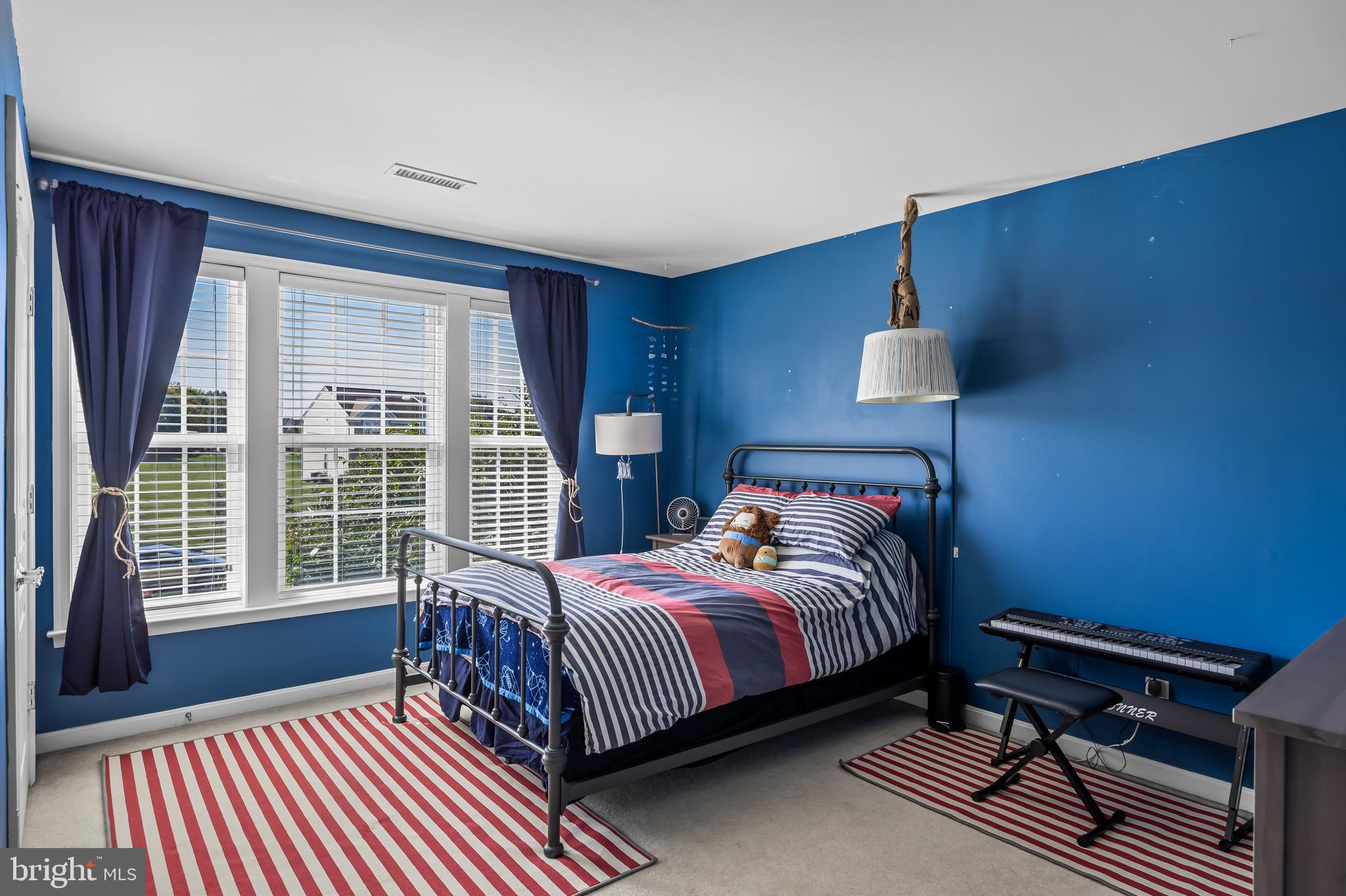 206 Sullivan Drive Mickleton, NJ 08056 - Photo 32 of 59 a bedroom with bed and a window