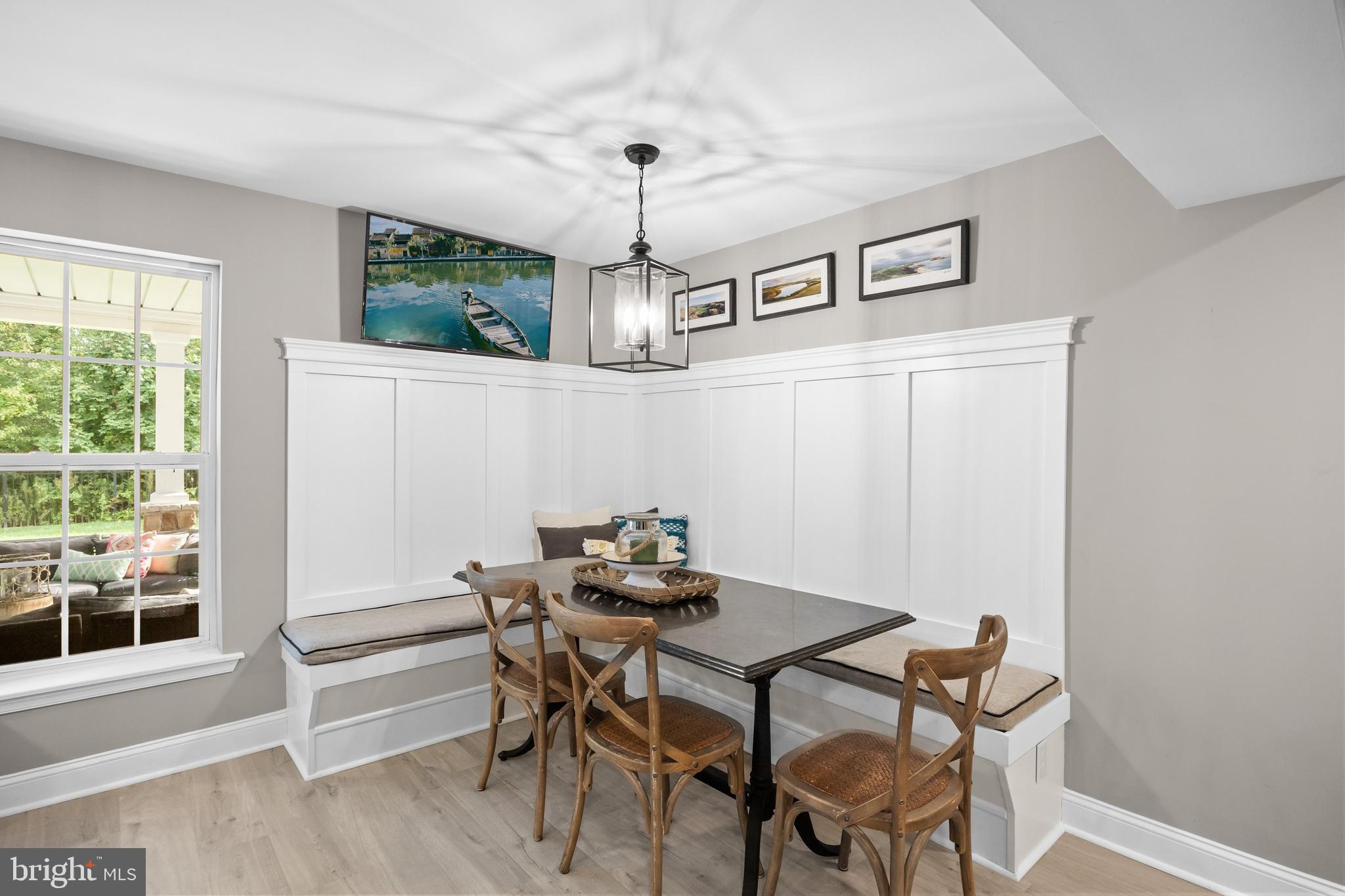 206 Sullivan Drive Mickleton, NJ 08056 - Photo 36 of 59 a view of a dining room with furniture window and wooden floor