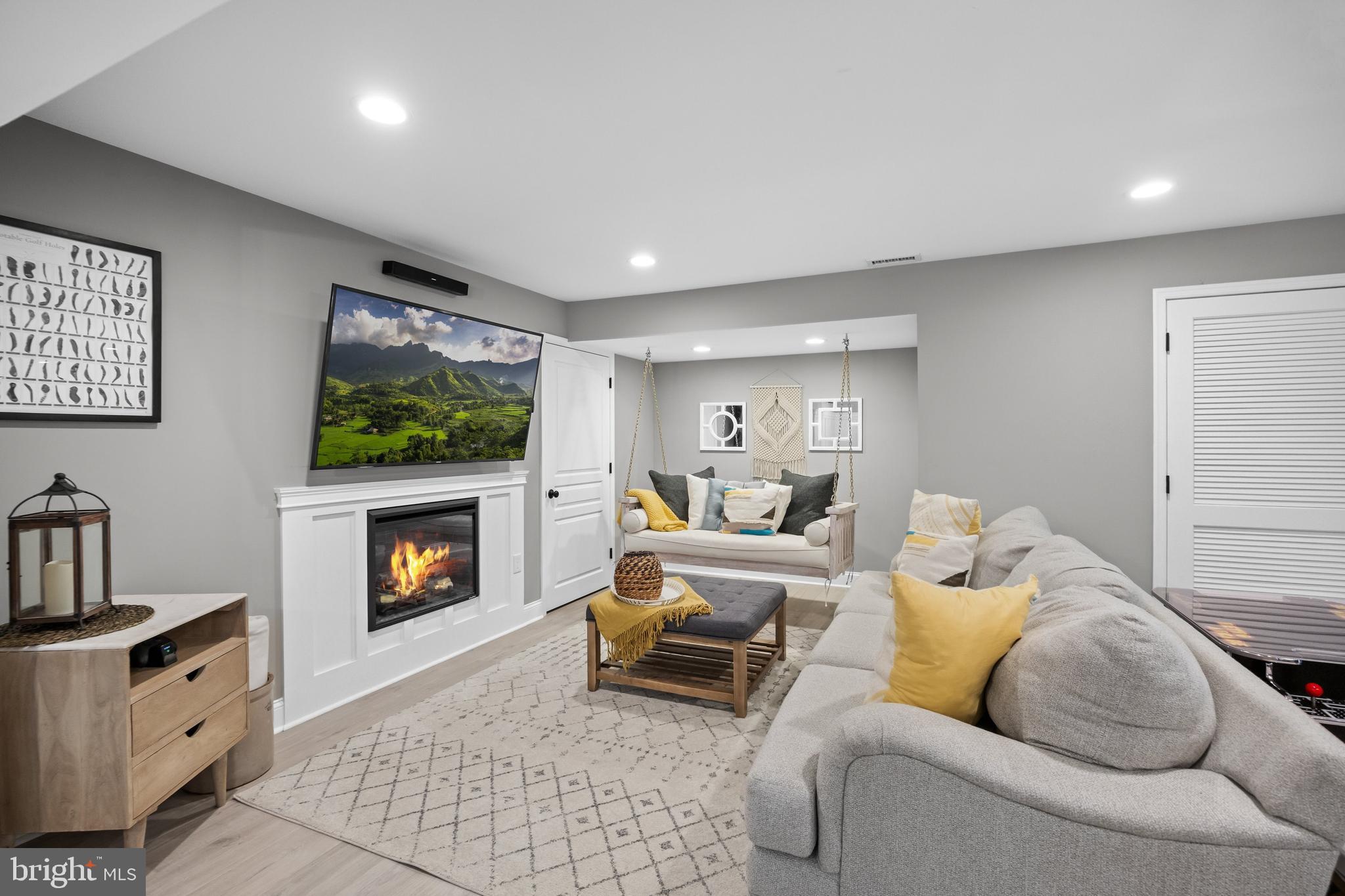 206 Sullivan Drive Mickleton, NJ 08056 - Photo 37 of 59 a living room with furniture and a fireplace