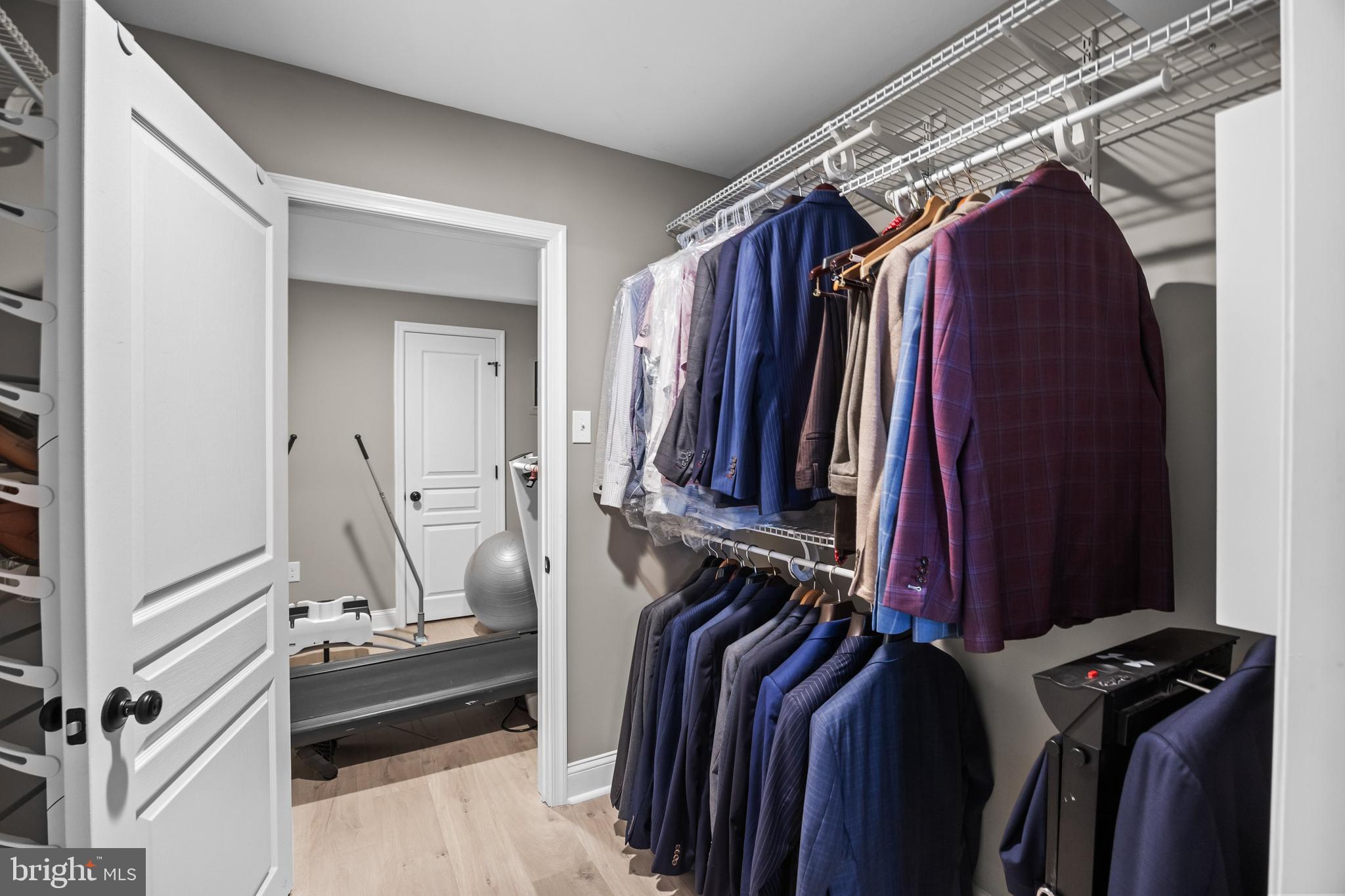 206 Sullivan Drive Mickleton, NJ 08056 - Photo 42 of 59 a view of walk in closet with clothes and shoes