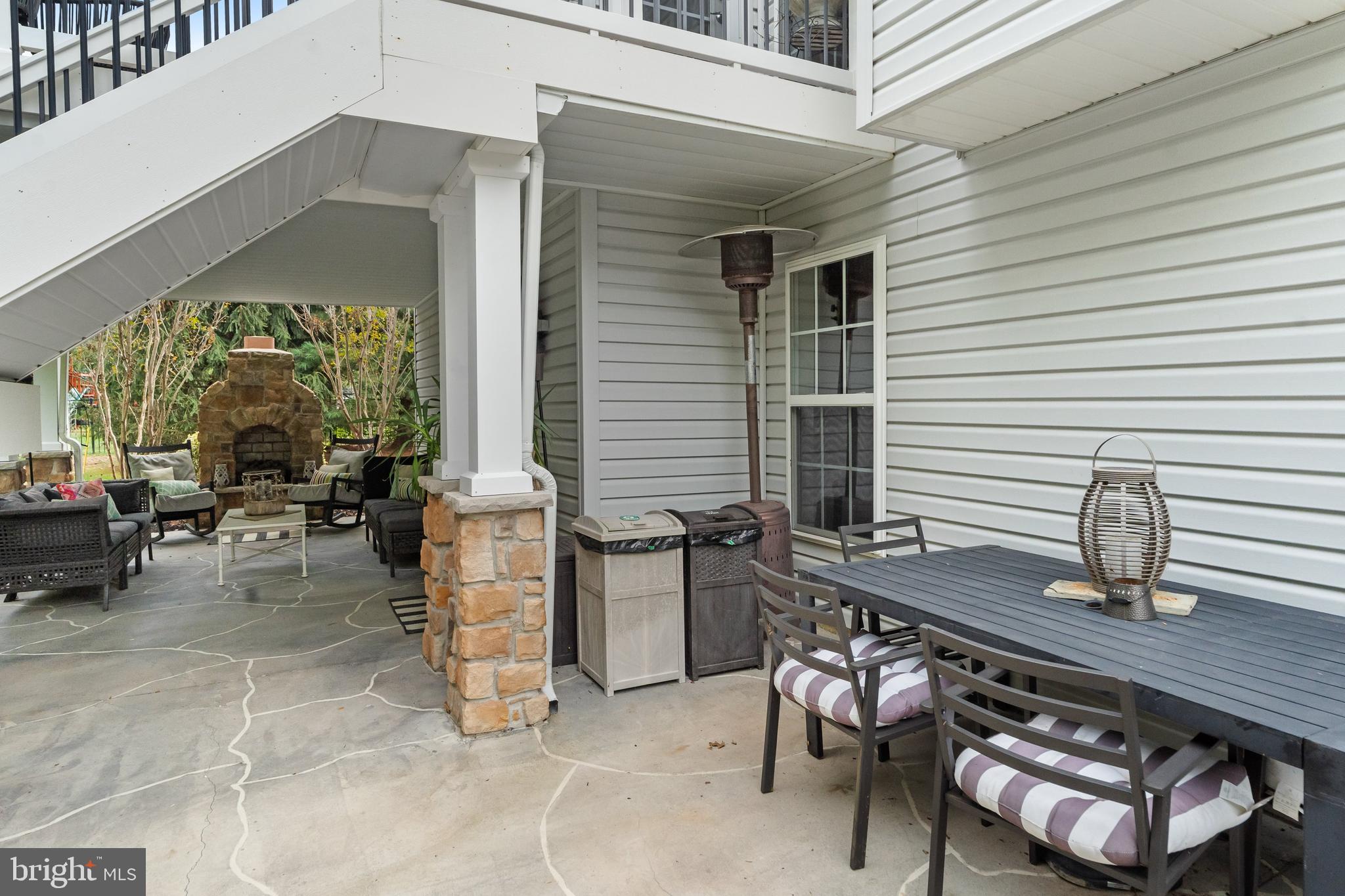 206 Sullivan Drive Mickleton, NJ 08056 - Photo 49 of 59 a backyard of a house with barbeque oven table and chairs