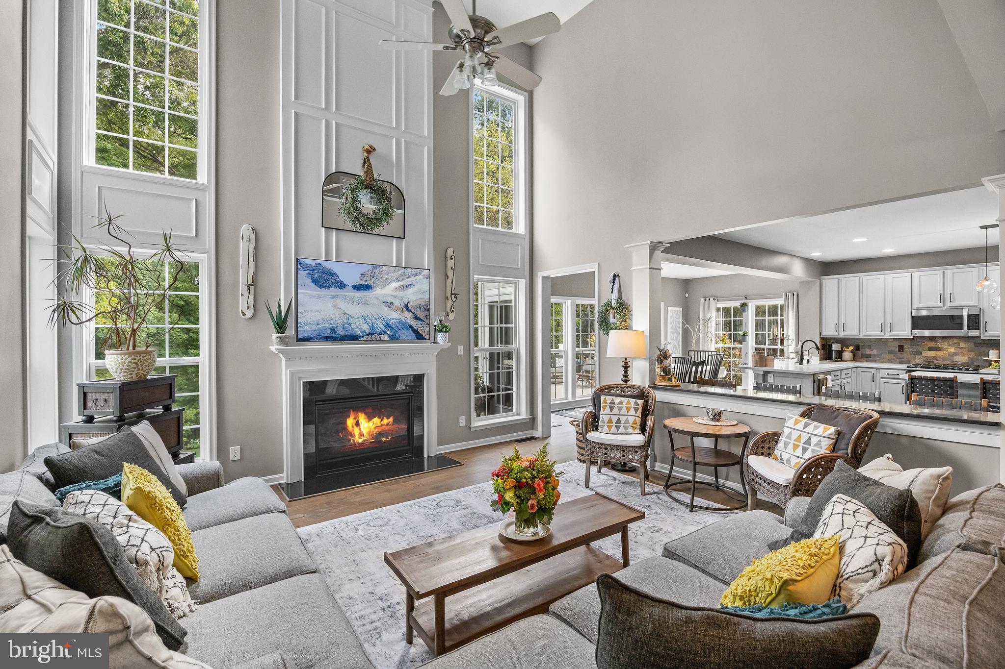 206 Sullivan Drive Mickleton, NJ 08056 - Photo 8 of 59 a living room with furniture fireplace and a large window