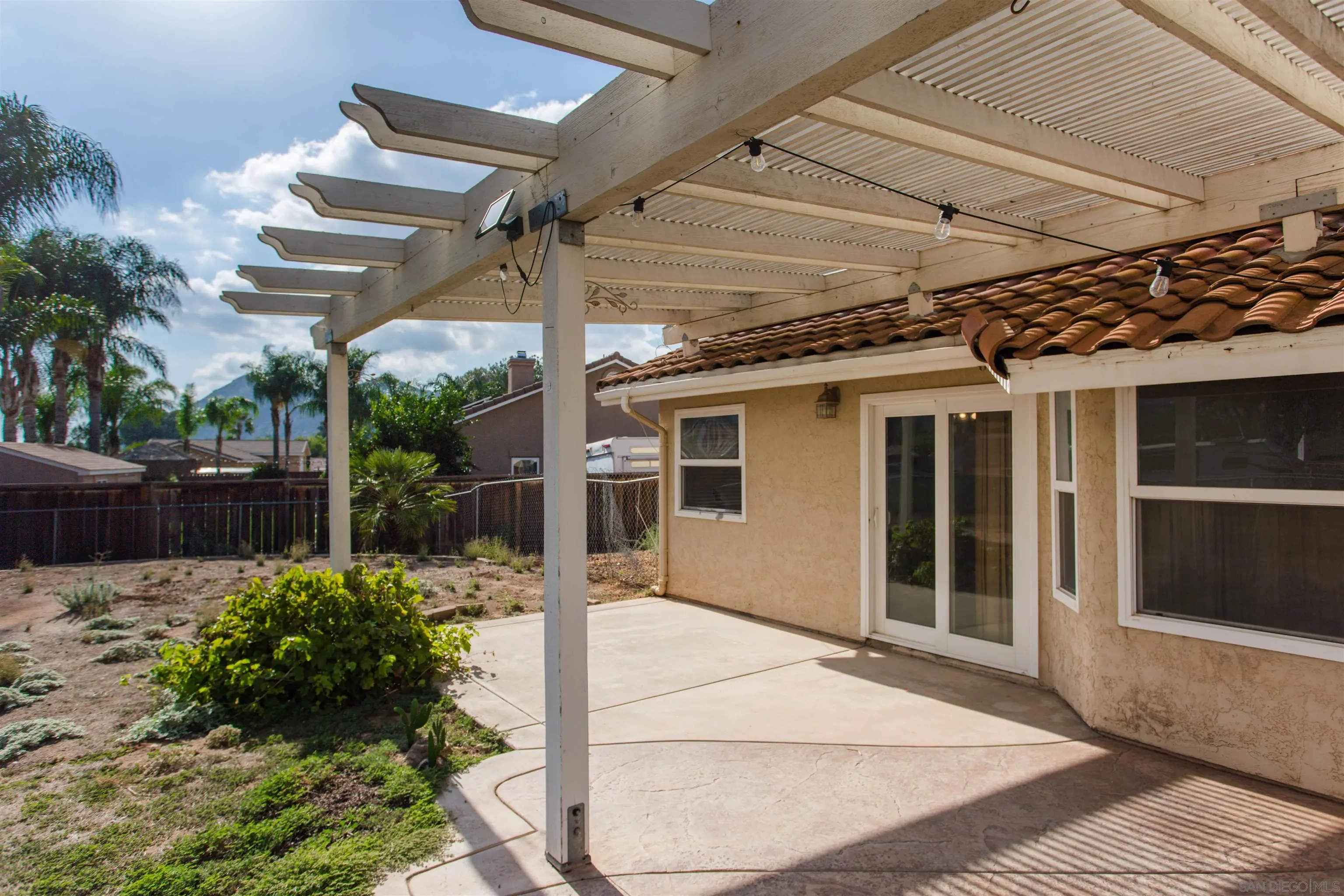 23641 Springwood Drive Ramona, CA 92065 - Photo 27 of 34 a view of a house with a patio
