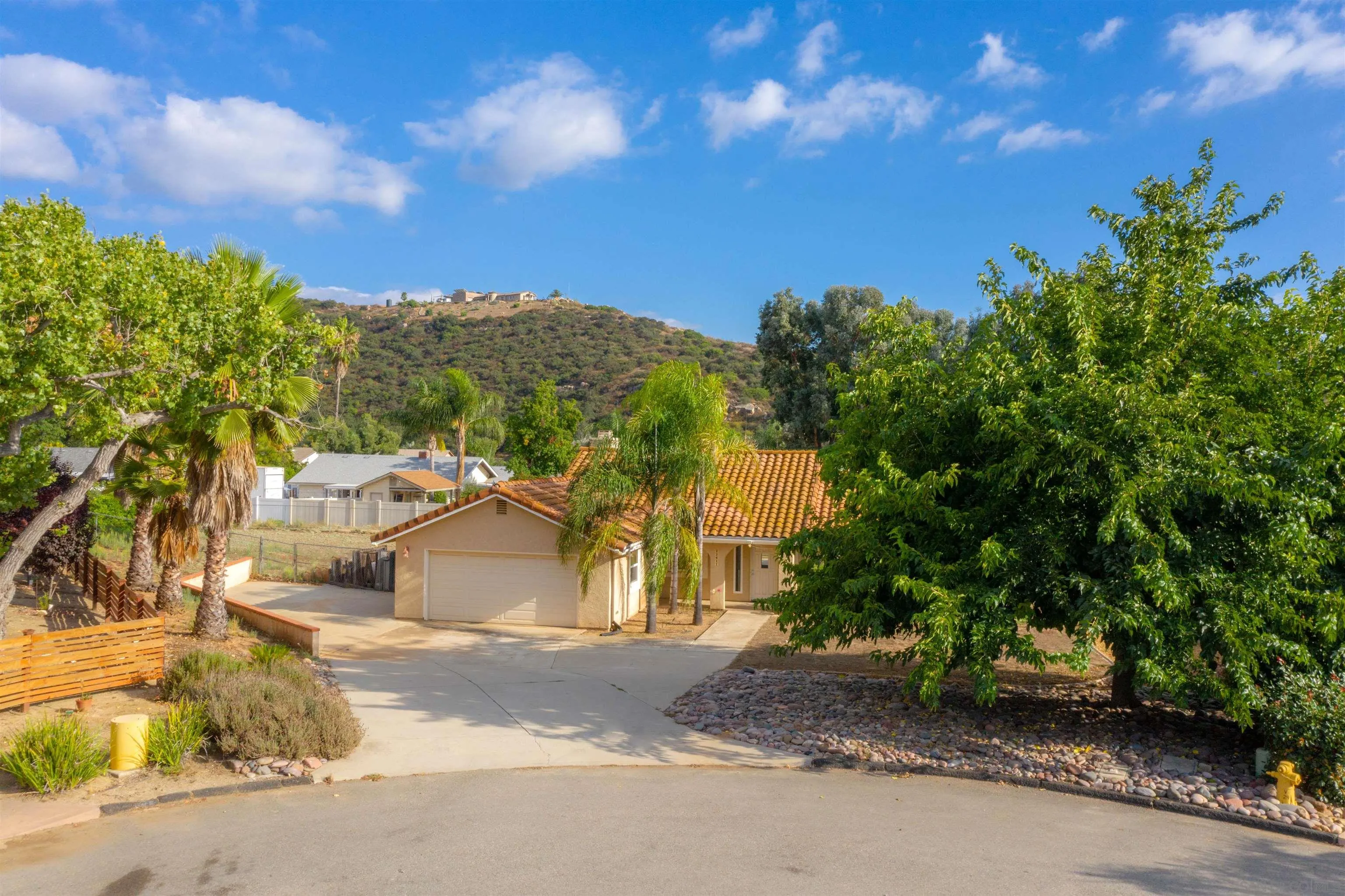23641 Springwood Drive Ramona, CA 92065 - Photo 34 of 34 a view of a house with a street