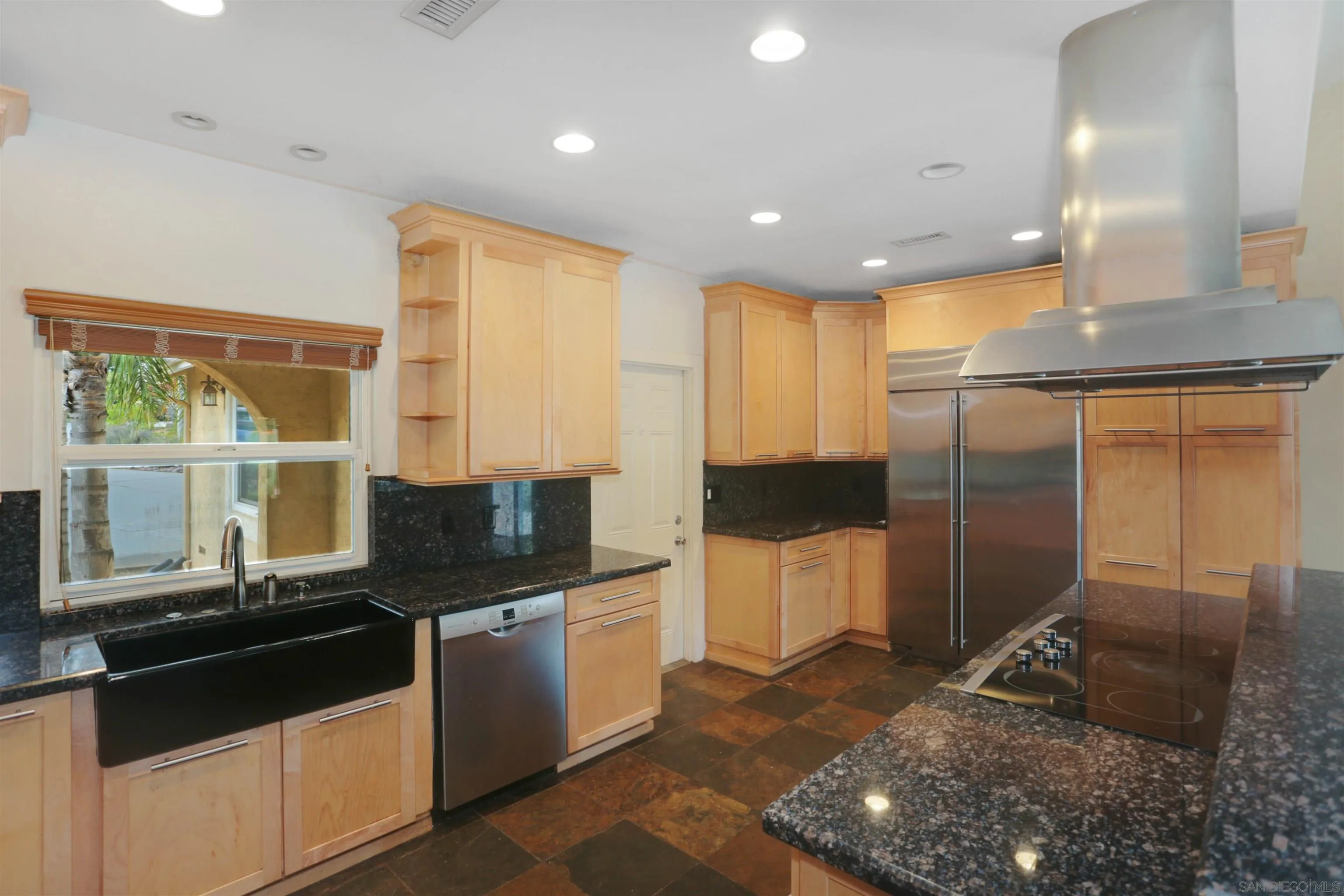 23641 Springwood Drive Ramona, CA 92065 - Photo 8 of 34 a kitchen with granite countertop sink stainless steel appliances and cabinets