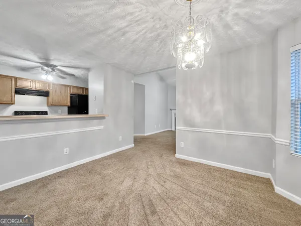 a view of a livingroom with a flat screen tv