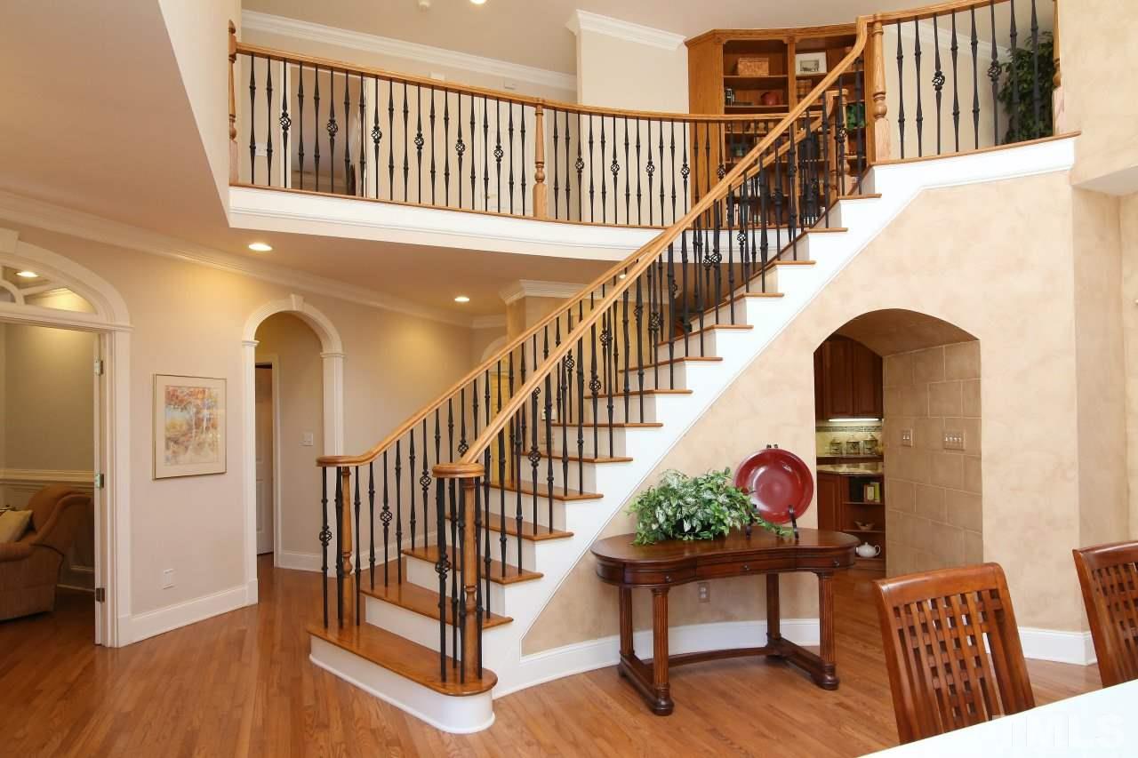 1841 Torrington Street Raleigh, NC 27615 - Photo 14 of 25 a view of entryway and hall with wooden floor