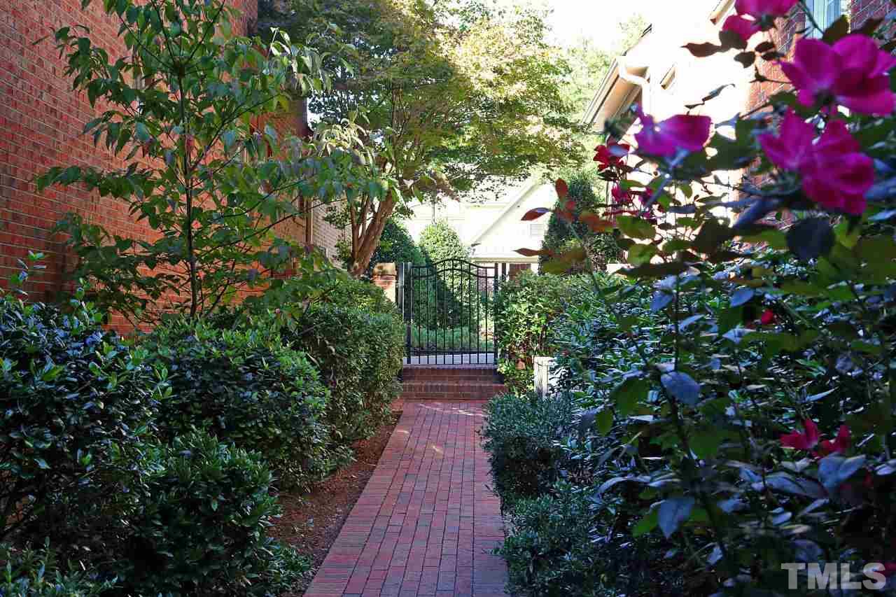 1841 Torrington Street Raleigh, NC 27615 - Photo 25 of 25 a backyard of a house with lots of green space