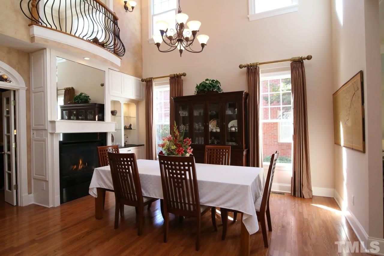 1841 Torrington Street Raleigh, NC 27615 - Photo 4 of 25 a view of a dining room with furniture window and wooden floor