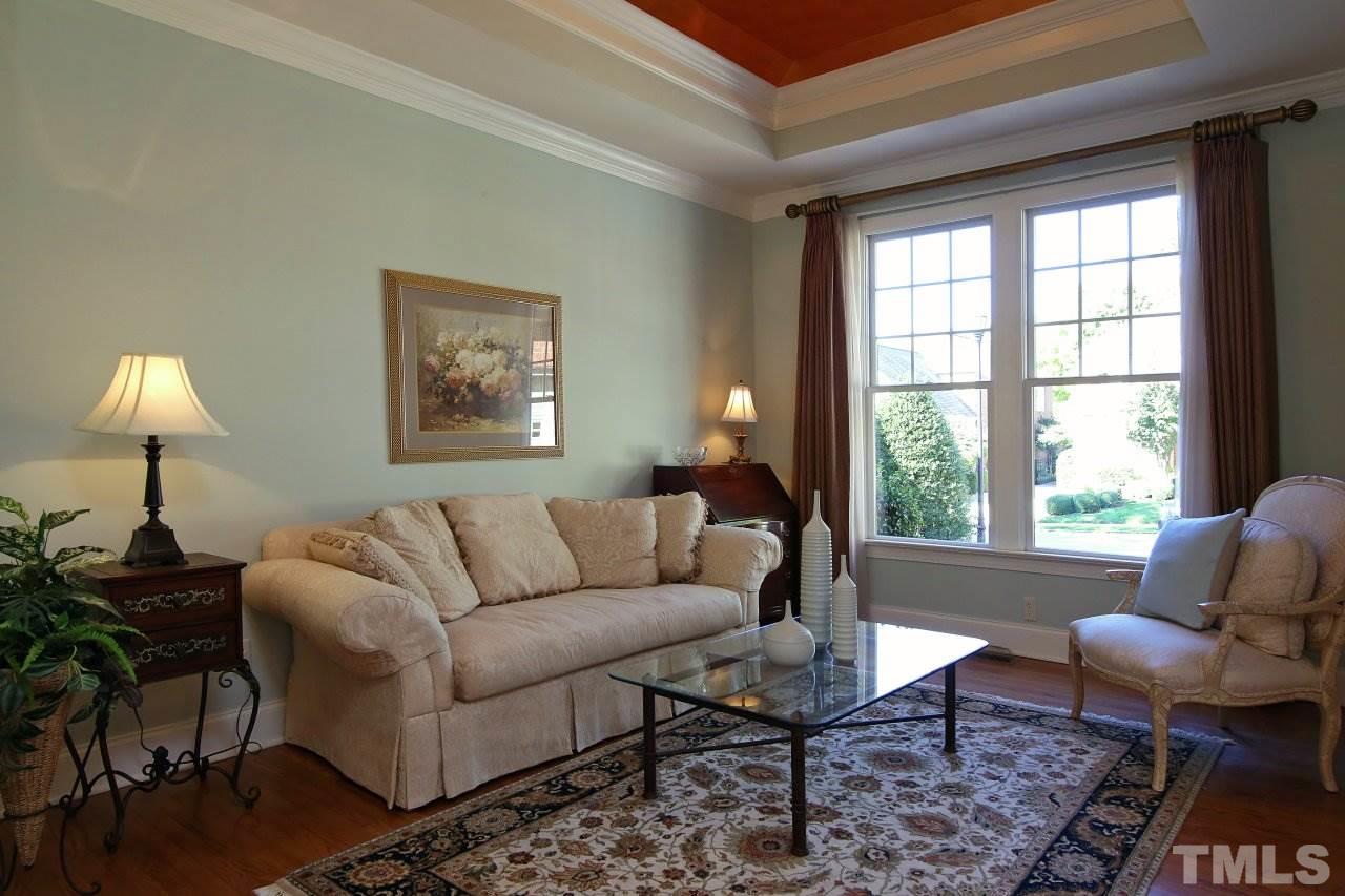1841 Torrington Street Raleigh, NC 27615 - Photo 5 of 25 a living room with furniture and a large window