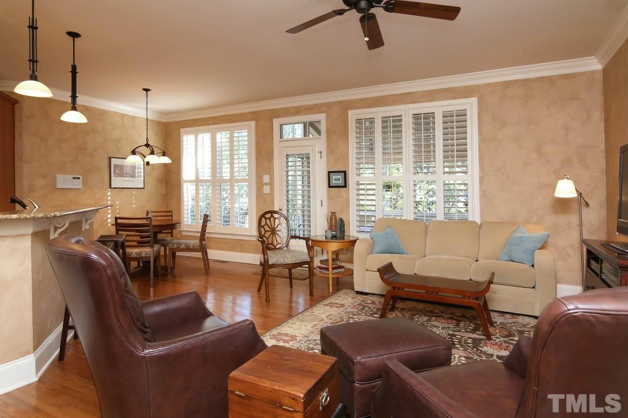 1841 Torrington Street Raleigh, NC 27615 - Photo 10 of 25 a living room with furniture and a large window