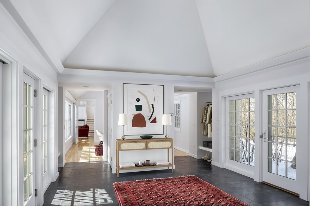 18 South Shaker Road Harvard, MA 01451 - Photo 11 of 36 a living room with furniture and a rug