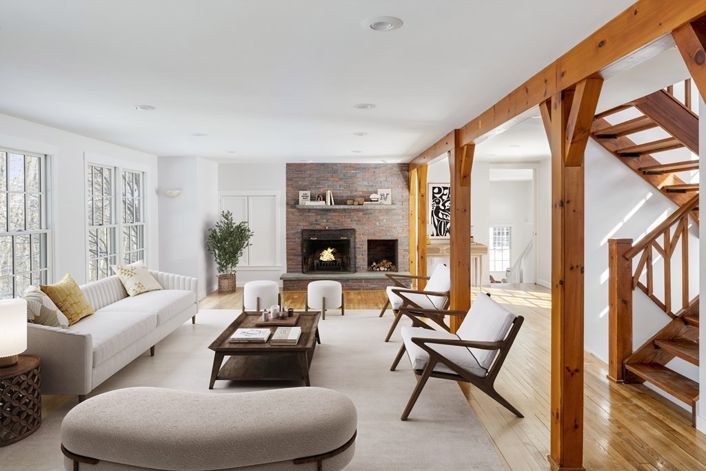 18 South Shaker Road Harvard, MA 01451 - Photo 16 of 36 a living room with furniture and a floor to ceiling window