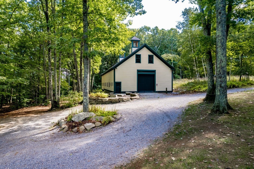 18 South Shaker Road Harvard, MA 01451 - Photo 5 of 36 a view of a house with backyard and trees